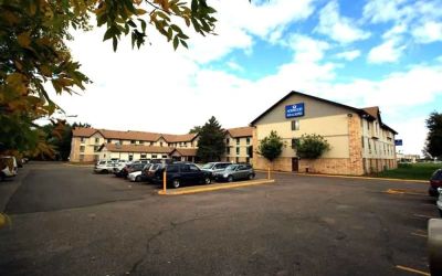 Parking area available at Norwood Inn & Suites - Roseville.