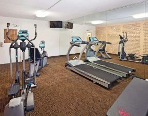 Fitness center at Norwood Inn Statefare Grounds.