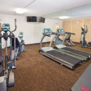 Fitness center at Norwood Inn Statefare Grounds.