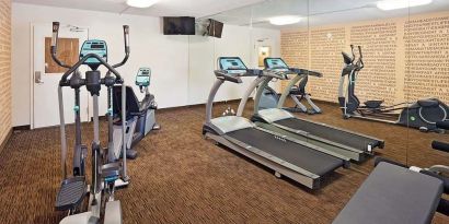 Fitness center at Norwood Inn Statefare Grounds.