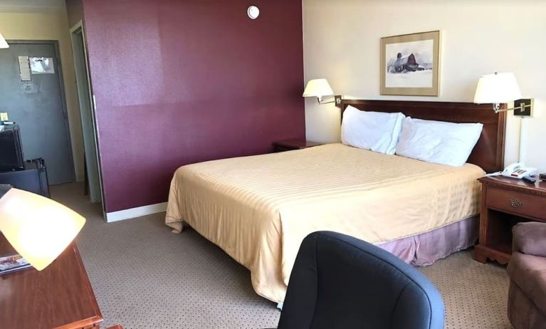 King bed at Norwood Inn & Suites La Crosse.