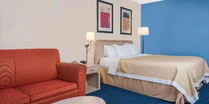 Day use room with living area at Norwood Inn & Suites La Crosse.