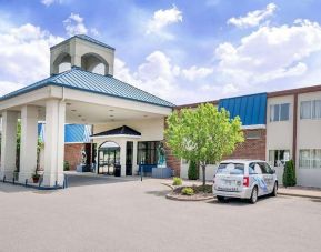 Hotel exterior and parking area at Norwood Inn & Suites La Crosse.