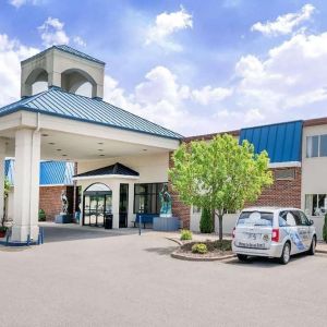 Hotel exterior and parking area at Norwood Inn & Suites La Crosse.