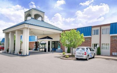 Hotel exterior and parking area at Norwood Inn & Suites La Crosse.