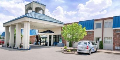 Hotel exterior and parking area at Norwood Inn & Suites La Crosse.