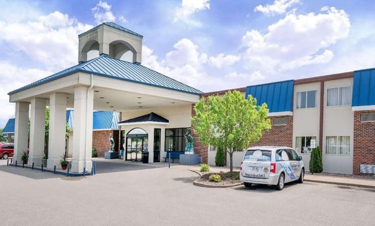 Hotel exterior and parking area at Norwood Inn & Suites La Crosse.