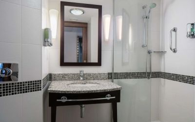 Guest bathroom with shower at Hampton By Hilton Birmingham Broad Street.