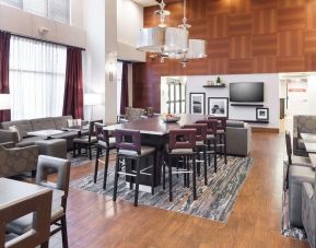 Dining area perfect for coworking at Hampton Inn Los Angeles-Orange County-Cypress.