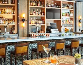Cozy hotel bar at The Citizen Hotel, Autograph Collection.