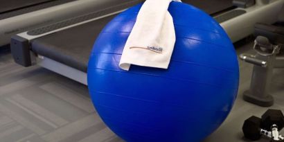 The hotel fitness center has free weights, treadmills, and a bench, as well as towels and gym balls.