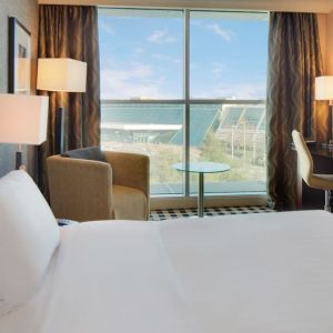 Day use room with work desk and lounge seating at DoubleTree By Hilton Newcastle International Airport.