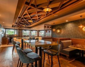 Dining area with comfortable seating at DoubleTree By Hilton Newcastle International Airport.