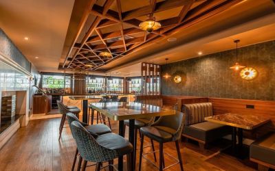 Dining area with comfortable seating at DoubleTree By Hilton Newcastle International Airport.