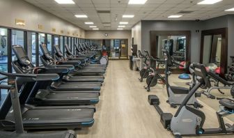 Fully equipped fitness center at Hilton Minneapolis.