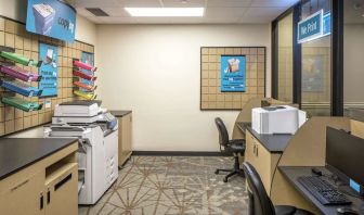 Business center with computers, printers and ergonomic chairs at Hilton Minneapolis.