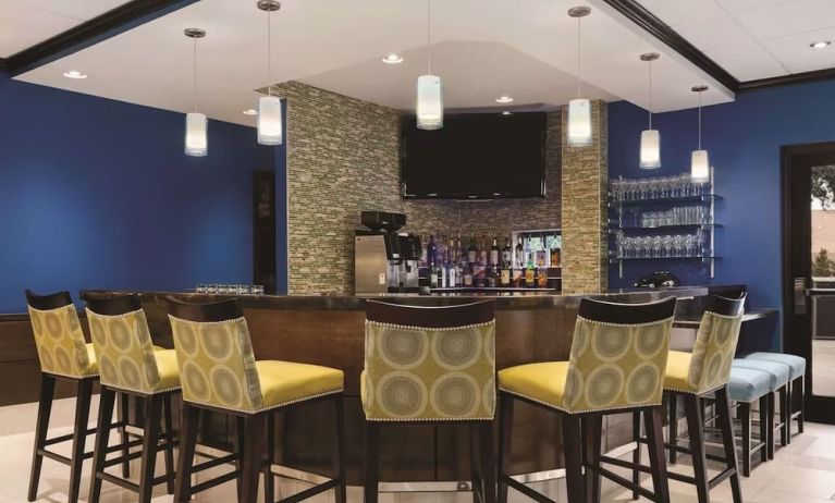 Hotel bar with lounge seating at Hilton Garden Inn Houston NW/Willowbrook.