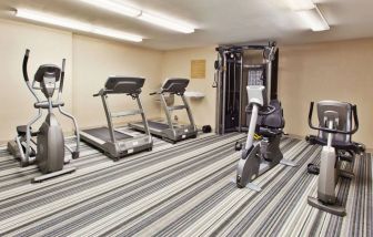 Sonesta Simply Suites Cleveland North Olmsted Airport’s fitness center has an assortment of exercise equipment including treadmills and cycling machines.