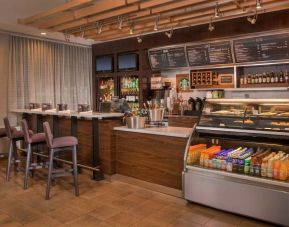 Sonesta Select Arlington Rosslyn breakfast area provides a range of healthy dining options, plus tall stool seating and multiple televisions.