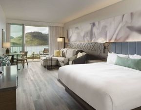 Royal Sonesta Kaua'i Resort Lihue double bed guest room, with sofa, balcony, and an ocean view.