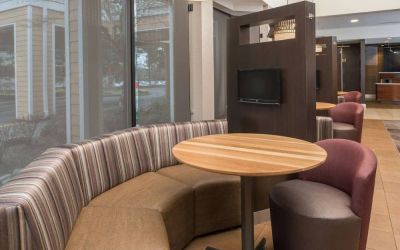 The hotel’s media pods offer a cozy setting for socializing or work, and each has a coffee table and TV.