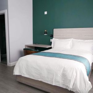 King bed with natural light. 