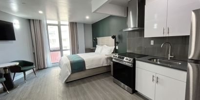 Spacious king room with kitchen.