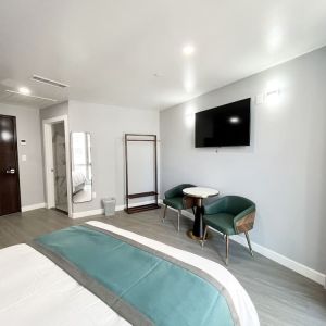 Day room with TV and natural light. 