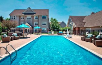 The hotel’s outdoor pool has armchairs and shaded tables/chairs nearby, and is equipped with a lift.