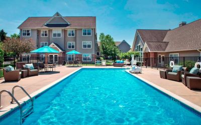The hotel’s outdoor pool has armchairs and shaded tables/chairs nearby, and is equipped with a lift.