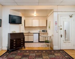 Day use room with TV and kitchenette at The Farrington Inn.