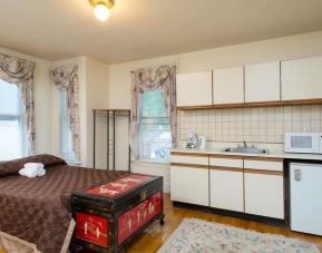 Day use room with natural like and small kitchen area at The Farrington Inn.