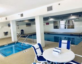 Indoor pool and hot tub at Country Inn & Suites By Radisson, Chicago O'Hare South.