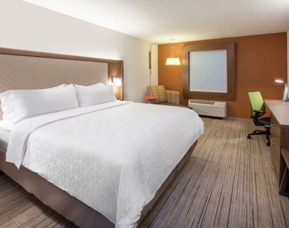 King bed with private bathroom at Holiday Inn Express & Suites Yorkville.