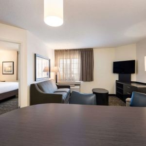 Spacious king room with work space at Sonesta Simply Suites Detroit Warren.
