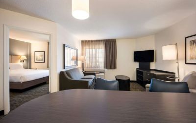 Spacious king room with work space at Sonesta Simply Suites Detroit Warren.