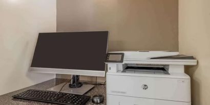 Business center at Sonesta Simply Suites Detroit Warren.