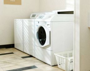 The hotel’s laundry room has multiple machines to make life easy for guests.