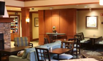 Sonesta ES Suites Portland Vancouver 41st Street’s lobby has extensive seating and numerous small tables.