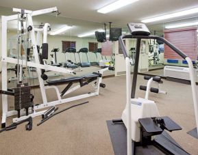 Sonesta Simply Suites Salt Lake City Airport’s fitness center has a diverse array of exercise machines and a television set.