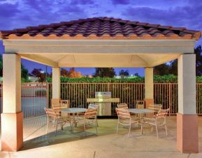 The gazebo at Sonesta Simply Suites Seattle Renton provides outdoors and under cover barbecue facilities, plus tables and chairs.