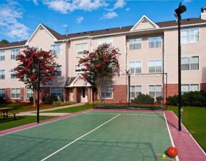 Sonesta ES Suites Birmingham Homewood’s outdoor sports court can be used for multiple activities, including tennis and basketball.
