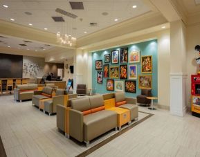 Lobby and coworking space at Sonesta Anaheim Resort Area.