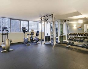Royal Sonesta Chicago Downtown’s fitness center is equipped with free weights and assorted exercise machines, and has a mirrored wall and city views.