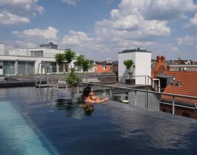 Relaxing rooftop pool at Wilmina Hotel.