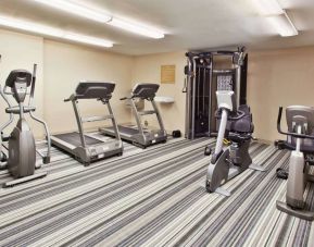 The fitness center in Sonesta Simply Suites Oklahoma City Airport includes an assortment of exercise equipment such as treadmills, an elliptical, and bikes.