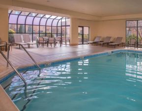 Sonesta Select Columbia’s indoor pool has large windows for plenty of light, and both loungers and chairs by the side.