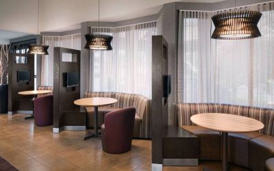 Sonesta Select Whippany Hanover’s media pods each have a television, coffee table, and comfy seating right by a window.