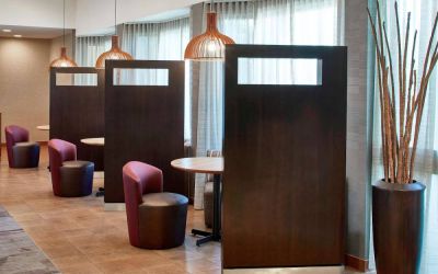 The hotel’s media pods are cozy nooks for socializing or co-working, with comfy seats and coffee tables by the windows.