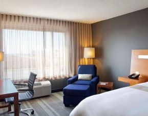 Delux king room with natural light at Novotel Toronto Vaughan Centre.